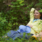 Nadine, reclining in the woods